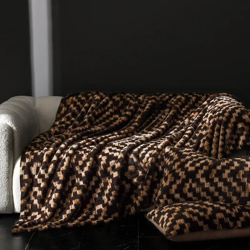 A cosy faux rabbit plush brown and beige geometric patterned throw blanket for living room decorbites cosy faux decor