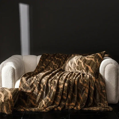 Cosybites cosy faux leopard print faux rabbit plush throw blanket in brown and tan for living room decor