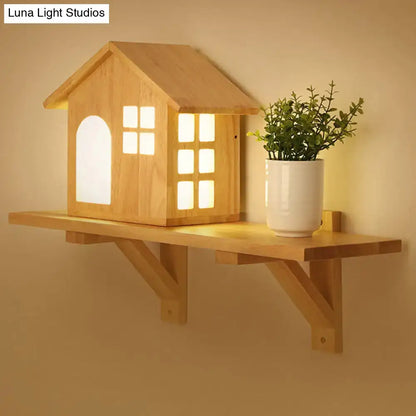 Cottage wood house wall sconce with lighted windows and arched doorway wooden shelf for bedroom lighting