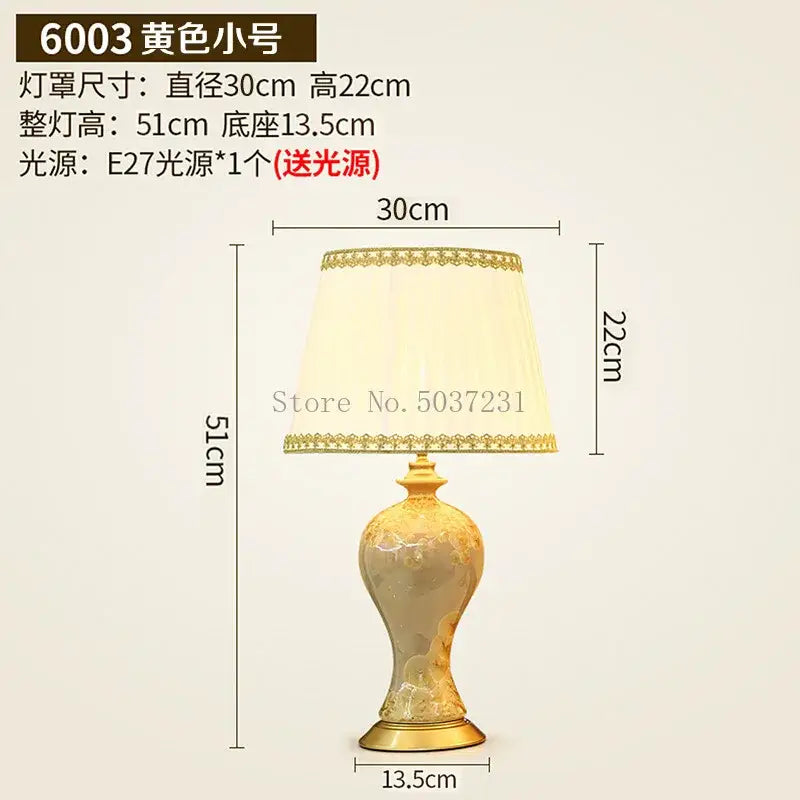 Golden ceramic table lamp with off-white lace-trimmed shade and ornate detailing from decorbites country ceramic table decor
