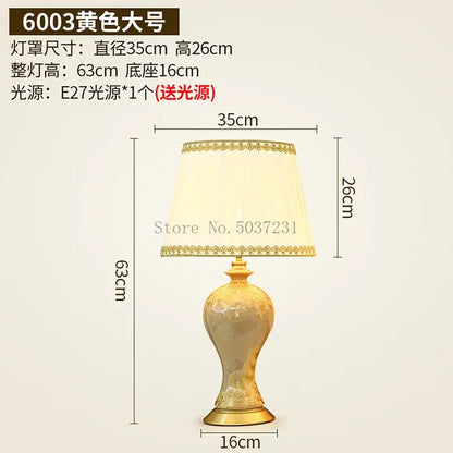 Golden ceramic table lamp with ornate vase-shaped base and cream fabric shade for decorbites country ceramic bedroom decor