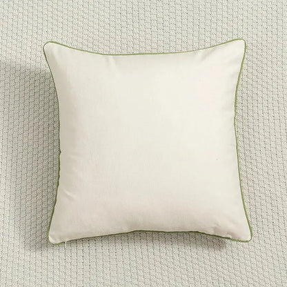 Cream-colored country floral embroidered cushion cover with subtle olive green piping for living room use
