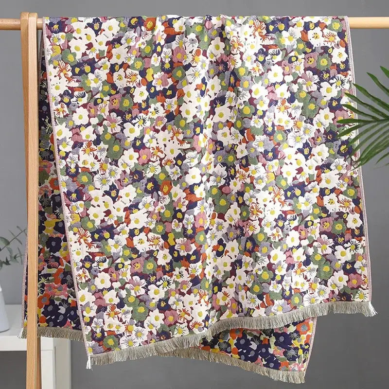 A country flowers cotton floral knit throw blanket with vibrant floral pattern and delicate fringed edges for decorbites decor