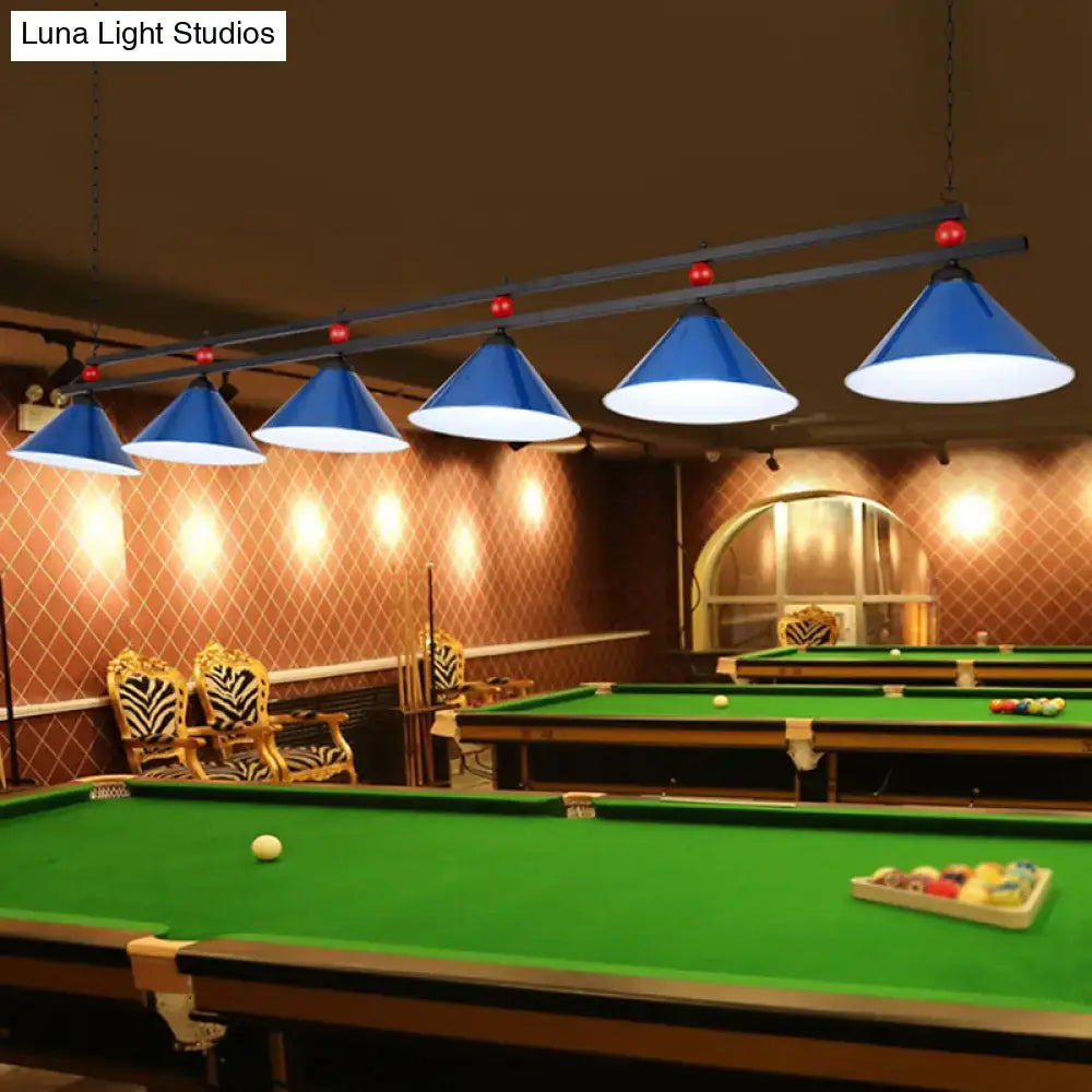 Blue conical pendant lights with white interiors hanging from black metal bar for country style bar island lighting fixture