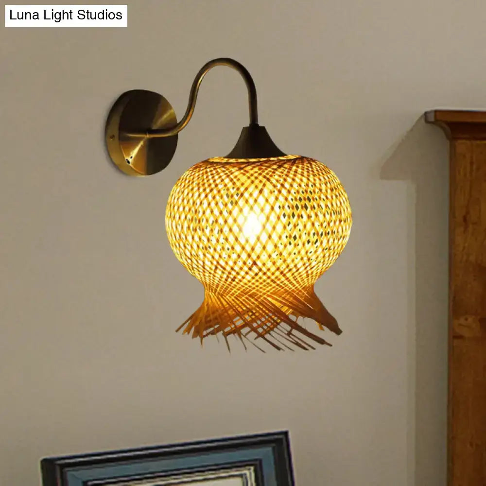 Warm-toned beige rattan wall light sconce with bamboo weave and curved brass arm for 110v-120v 220v-240v use