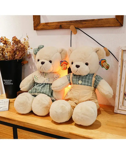 Cream-colored plush couple bear toys dressed in green and white plaid outfits with lace details for christmas gift