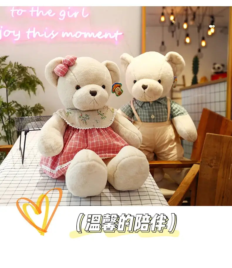 Cream-colored plush toys couple bear wearing pink and white checkered dress with lace trim for christmas gift