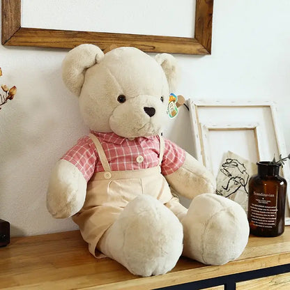 Cream-colored plush couple bear wearing pink and white plaid shirt with beige overalls from decorbites plush toys