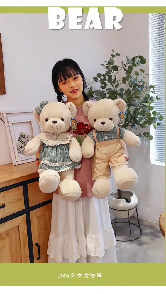Two plush toys of a DecorBites couple bear plush featuring one in green checkered dress and the other in beige overalls