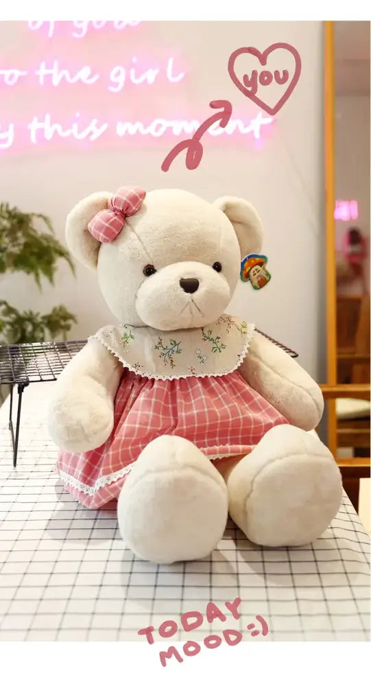 A plush white couple bear wearing a pink checkered dress and bow from decorbites™ 80cm couple bear plush toys