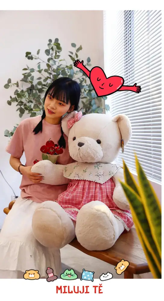 A plush white couple bear wearing a pink and white checkered dress with floral collar from decorbites plush toys