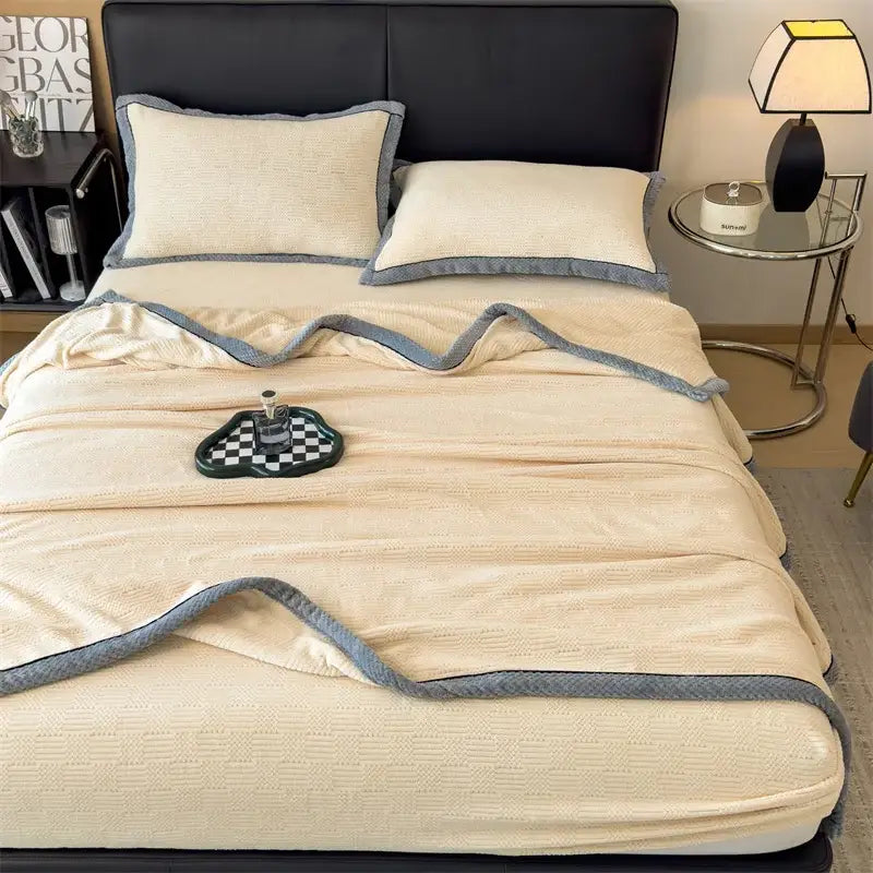Cream-colored cozy carved velvet quilted throw blanket with soft gray braided border for bedroom decorbites cozy carved velvet