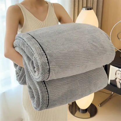 A cozy carved velvet gray corduroy blanket with soft fleece lining and black stitched edges for bedroom decorbites cozy carved use