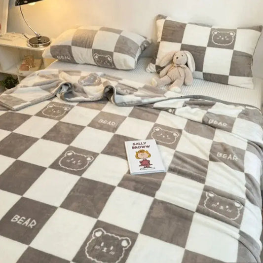 Cozy checkered fleece blanket in gray and white with embroidered bear faces and bear text for bedroom decorbites cozy checkered