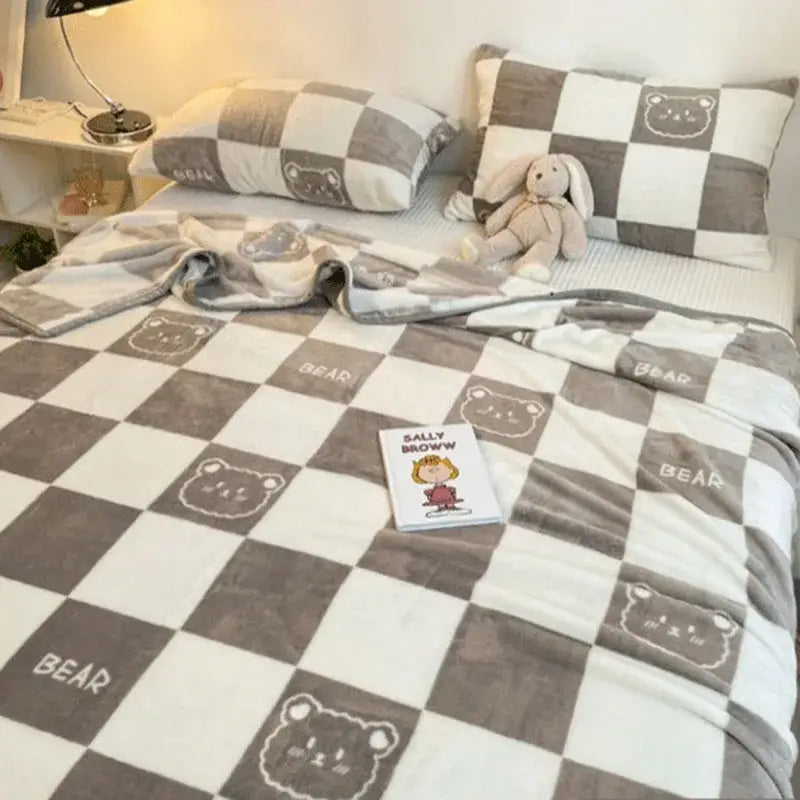 Cozy checkered fleece blanket in gray and white with embroidered bear faces and bear text for bedroom decorbites cozy checkered