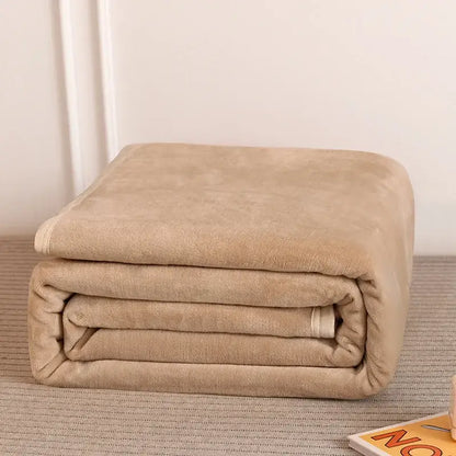 A plush beige cozy checkered fleece blanket neatly folded gray and white bear bedroom decorbites cozy checkered