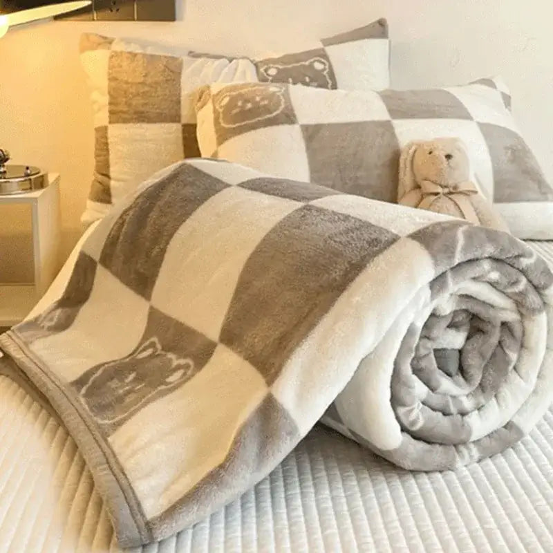 Cozy checkered fleece blanket in gray and cream with embroidered bear faces from decorbites cozy checkered collection