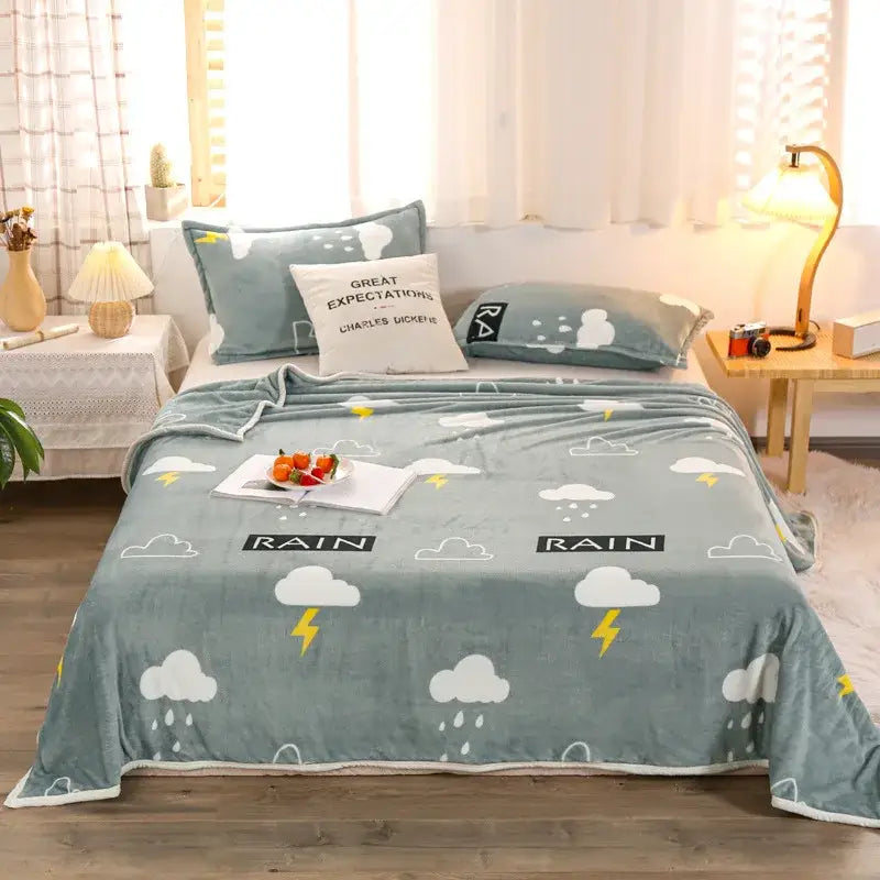 Soft teal decorbites cozy checkered fleece blanket with white clouds and yellow lightning bolts for bedroom throw use