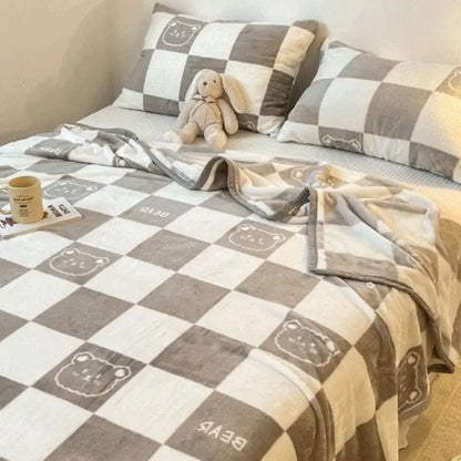 Soft gray and white checkered cozy checkered fleece blanket with embroidered bear faces for bedroom decorbites cozy checkered throw