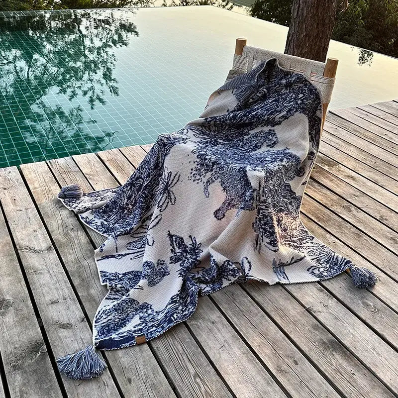 Cozy Chinese ink blue and white toile knit blanket with cream and navy tassels for bedroom decorbites cozy Chinese use