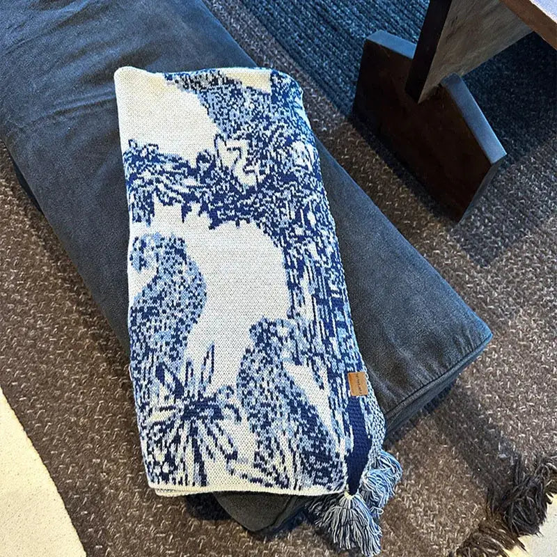 Cozy chinese ink blue and white toile knit blanket features a detailed landscape pattern and tassels for bedroom decorbites cozy chinese use