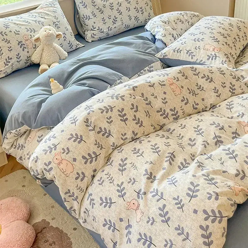 Cream-colored cozy cotton bedding set with soft pink bunny and gray leafy vine pattern by decorbites cozy cotton