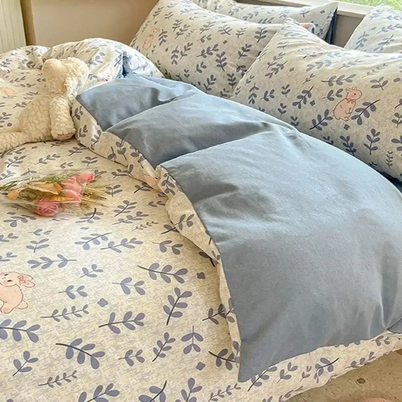 Cozy cotton bedding set with blue and cream leaf pattern and pink bunny illustrations by decorbites cozy cotton