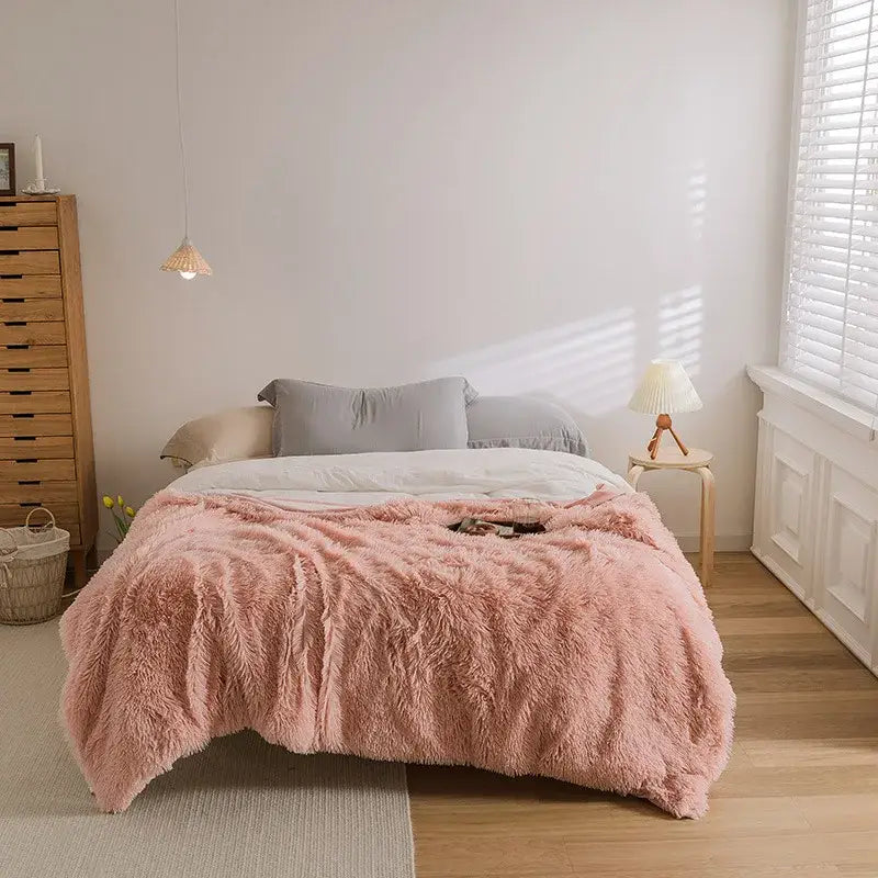 Pink cozy faux fur throw blanket with soft fluffy texture ideal for bedroom decorbites cozy faux style