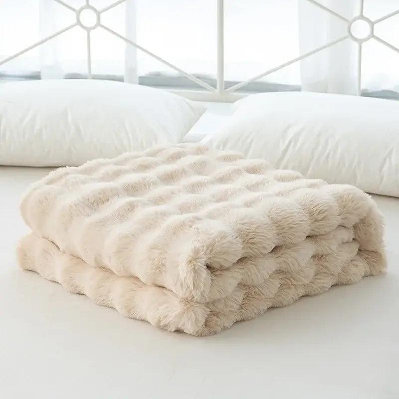 Cream-colored cozy faux rabbit velvet throw blanket with quilted textured surface for bedroom decorbites cozy faux use