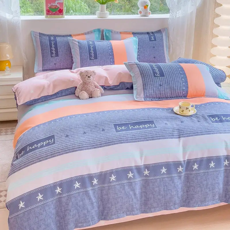 Pastel blue and peach striped bedding set with be happy text and white stars featured in decorbites cozy flower print design