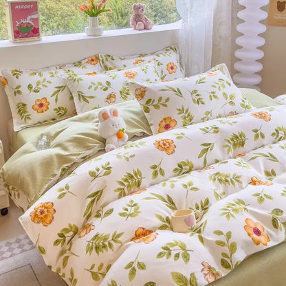 White duvet cover with delicate orange and green floral pattern in soft fabric from decorbites cozy flower print bedding set