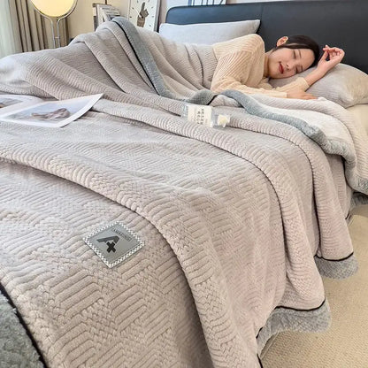 Beige decorbites cozy jacquard plush throw blanket with textured weave and gray fleece trim for bedroom use