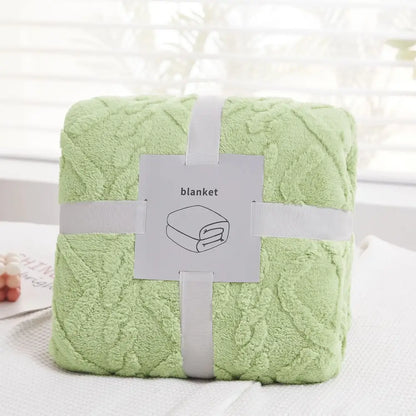 A soft light green plush blanket with a quilted diamond pattern perfect for cozy jacquard plush decorbites living room throw