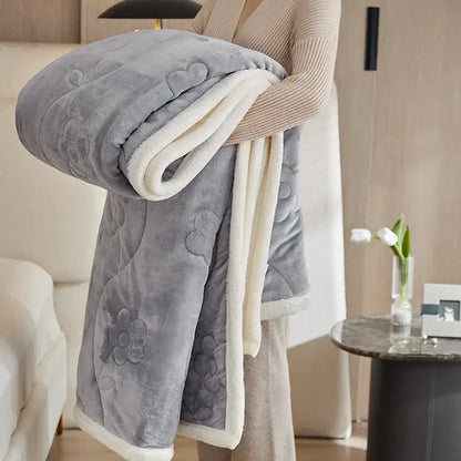 Gray wool sofa blanket with embroidered floral patterns and soft white fleece lining for decorbites cozy living room throw