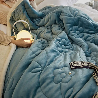 Soft teal plush wool sofa blanket with quilted floral patterns for decorbites cozy living room throw use