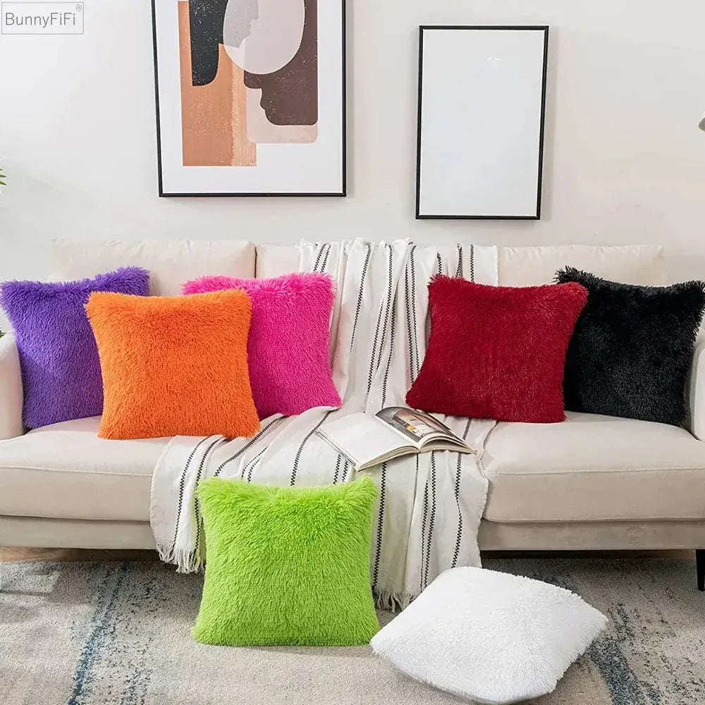 A set of decorbites cozy plush fur cushion covers in vibrant hues including white and grey for living room decor