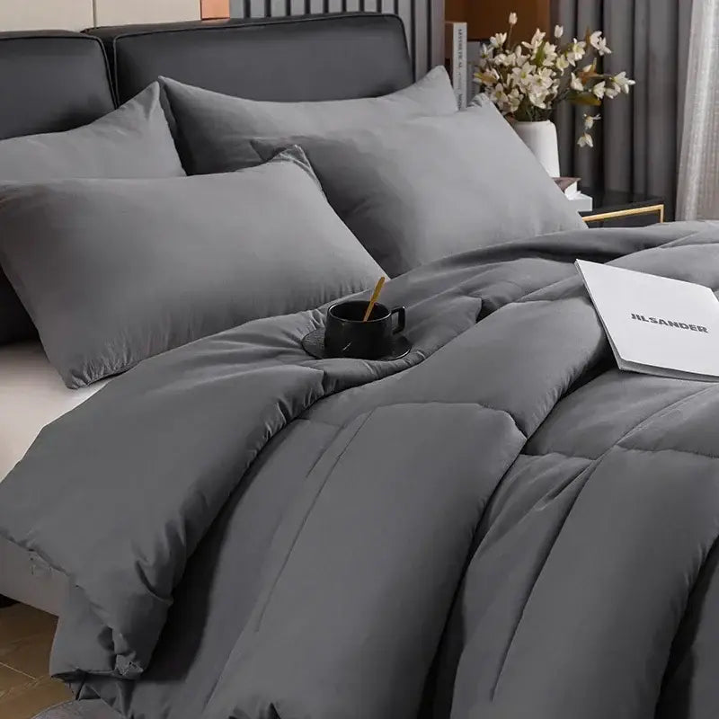 Gray quilted duvet set with soft plush texture and subtle stitching in decorbites cozy spring queen bedding