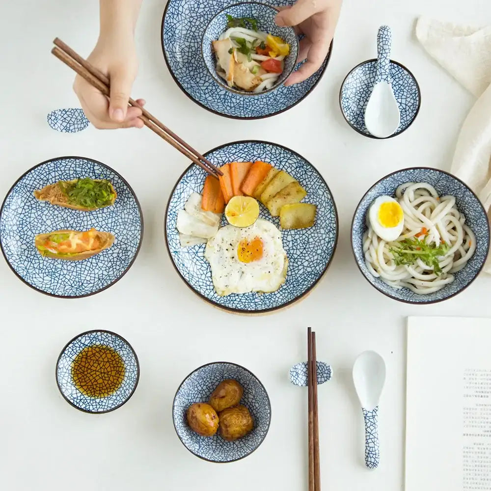 Crackle glaze blue ceramic dinner plate set with black rims and matching spoons from decorbites ceramic dinner collection