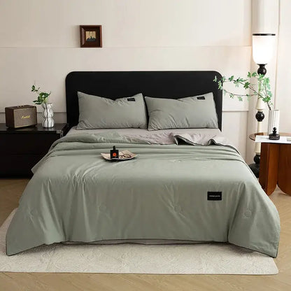 A soft sage green quilted duvet set with subtle texture and black tags from decorbites ice cream cool feel collection