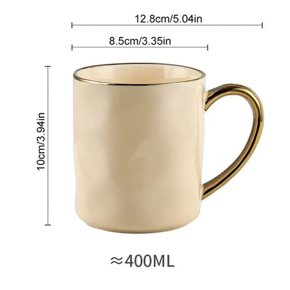 Cream-colored ceramic gold rim mug with matte finish from nordic gold rim mug set for kitchen coffee use