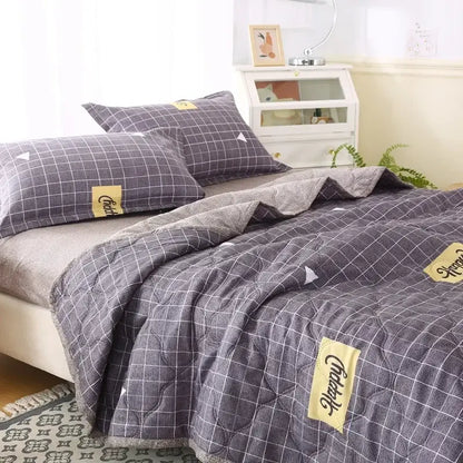 Gray quilted bear quilt with white grid pattern and yellow happy patches in cream bear pillowcase set bedding set