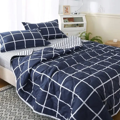 Navy blue quilted bear quilt with white grid pattern and matching pillowcase set in cream bear bedding set