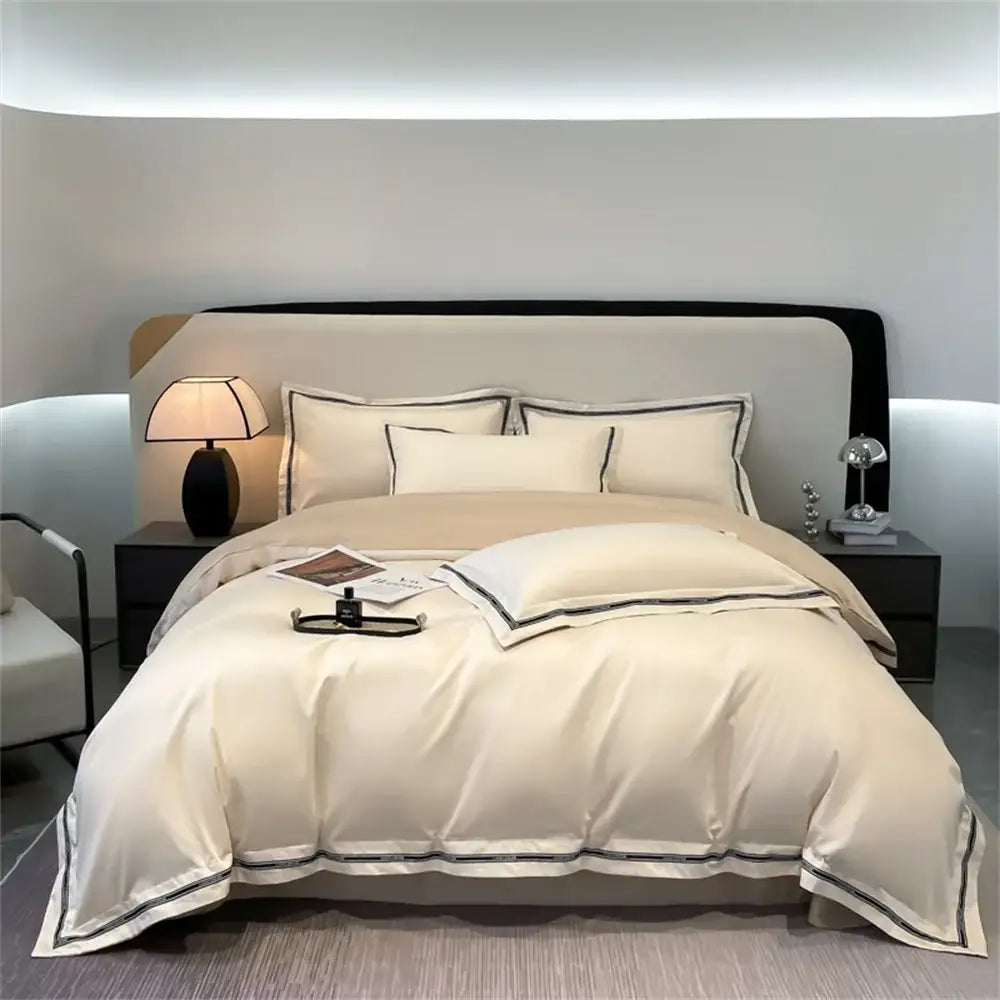 Cream and black egyptian cotton bedding set featuring cream satin with elegant black piping for bedroom linens