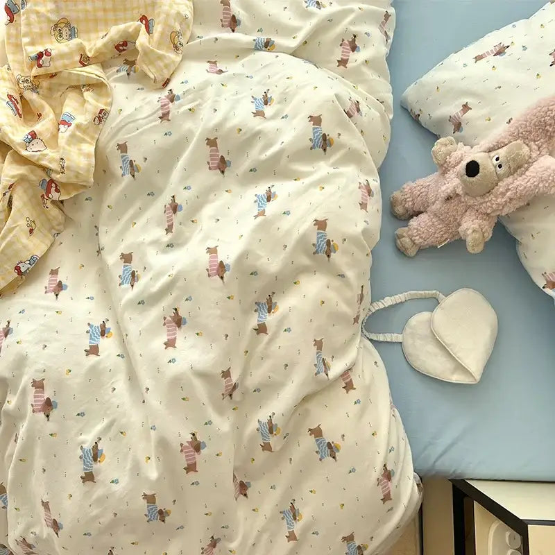 Cream bedding set featuring decorbites cartoon pattern with playful bears in various outfits for bedroom decor