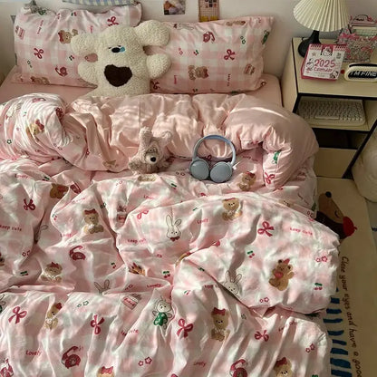 Pink satin bedding set featuring decorbites cartoon pattern of teddy bears bows and keep cute text for bedroom decor