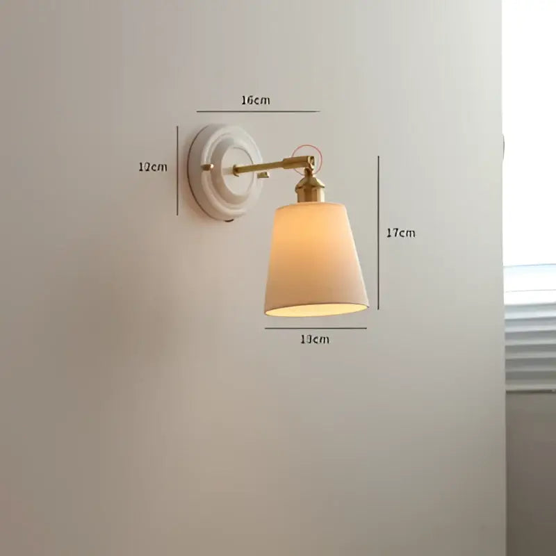 Cream ceramic led wall light with copper arm and beige fabric shade by decorbites ceramic led for bedroom sconce decor