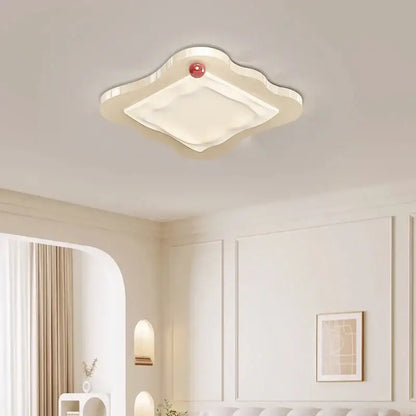 Cream cloud led ceiling light with a glossy finish and a red accent for decorbites cream led bedroom decor