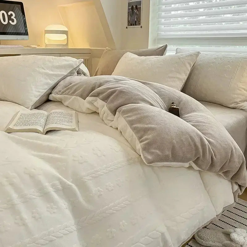 Cream cozy milk fleece bedding set featuring a cream-colored plush duvet with textured embroidered patterns
