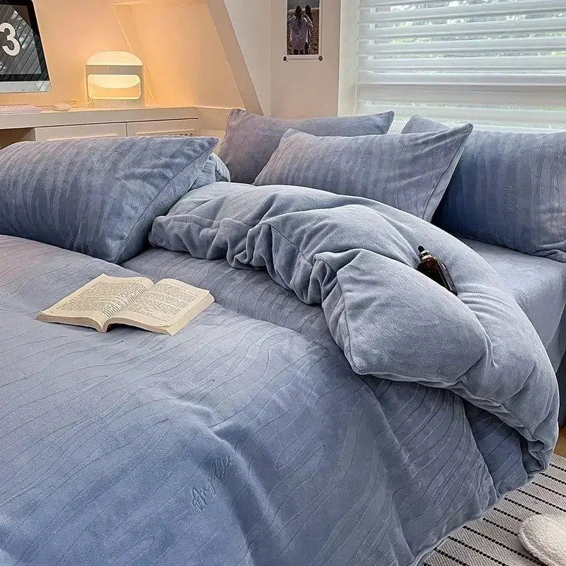 Soft light blue velvet duvet set featuring a subtle textured pattern from decorbites cozy milk fleece bedding set