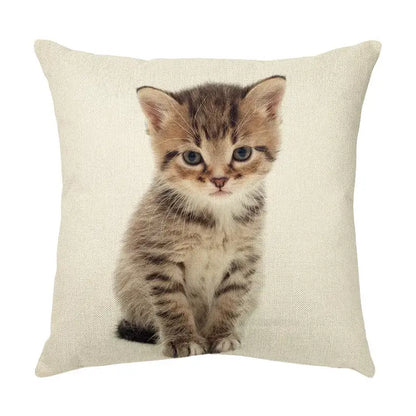Beige linen throw pillow with cute cat face printed, featuring blue-eyed tabby kitten for living room decor